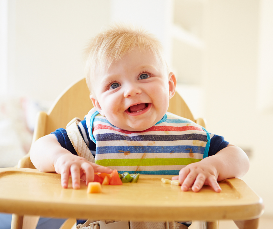 baby learning baby-led feeding